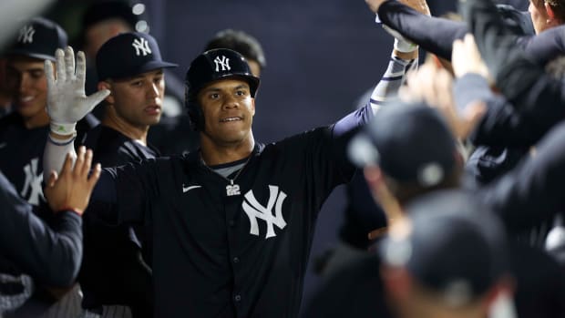 New York Yankees right fielder Juan Soto celebrates after hitting a home run against the Toronto Blue Jays.